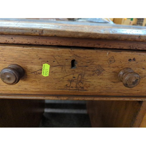 513 - Early C20 pedestal desk, with flanked 3 drawer units under single large drawer. W113cm D59cm H76cm