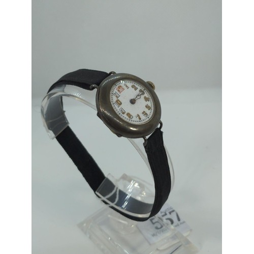 557 - Military style silver cased watch, case diameter 30cm