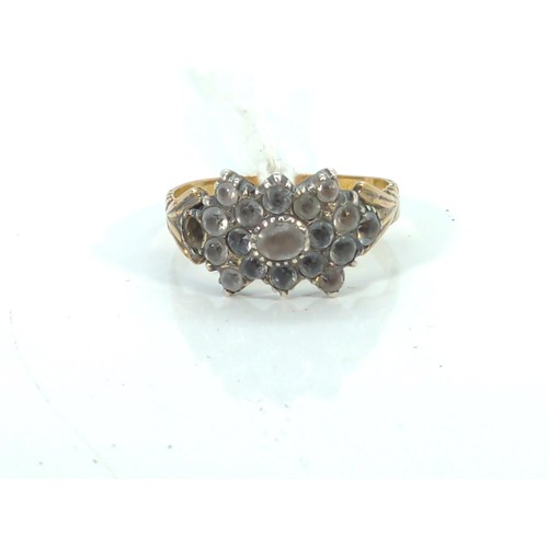 579 - Victorian yellow metal ring, tests positive for 9ct gold, set with paste stones, size T, gross weigh... 