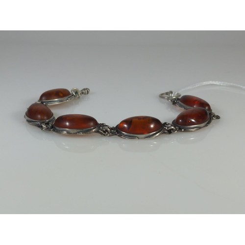 588 - Silver and amber bracelet, circumference 195mm, gross weight 19.2 grams