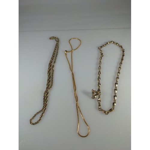 596 - Three silver neck chains, gross weight 54 grams