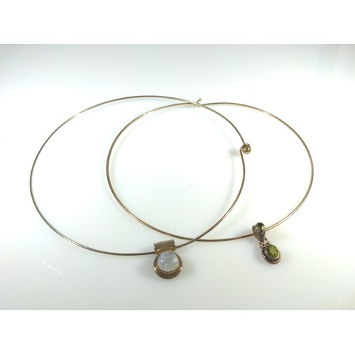 597 - Two silver stone set pendant choker necklaces, gross weight 22 grams