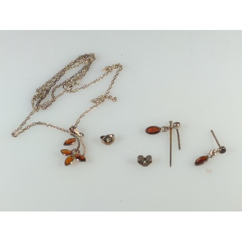 601 - Four pairs of silver mounted earrings, including one with matching pendant with chain