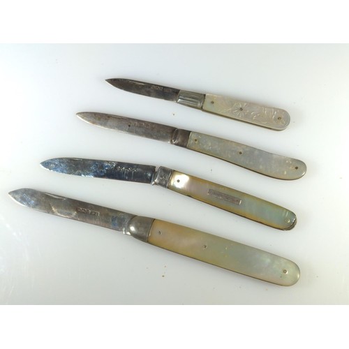 618 - Four silver mother-of-pearl handled fruit knives, various makers and dates