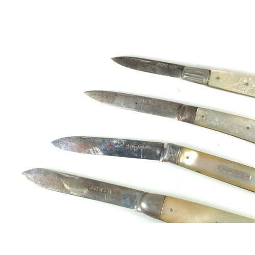 618 - Four silver mother-of-pearl handled fruit knives, various makers and dates