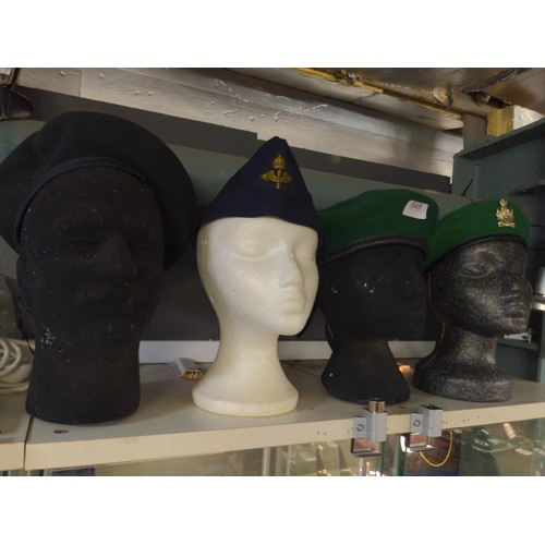 649 - Four military hats, including three berets and a side cap