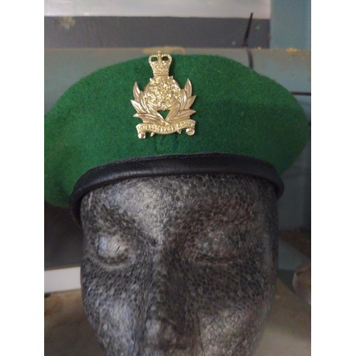 649 - Four military hats, including three berets and a side cap