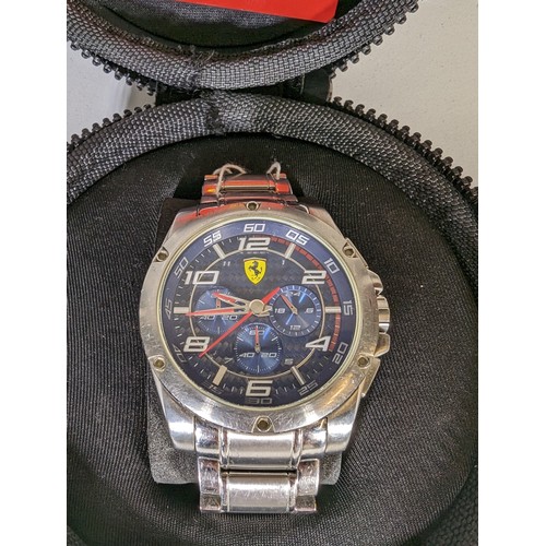 553 - Ferrari gents chronograph stainless steel wristwatch, numbered SF.04.1.14.0020 with zipped case and ... 