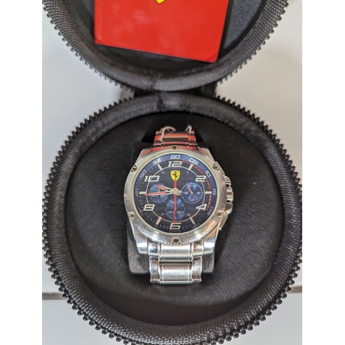 553 - Ferrari gents chronograph stainless steel wristwatch, numbered SF.04.1.14.0020 with zipped case and ... 