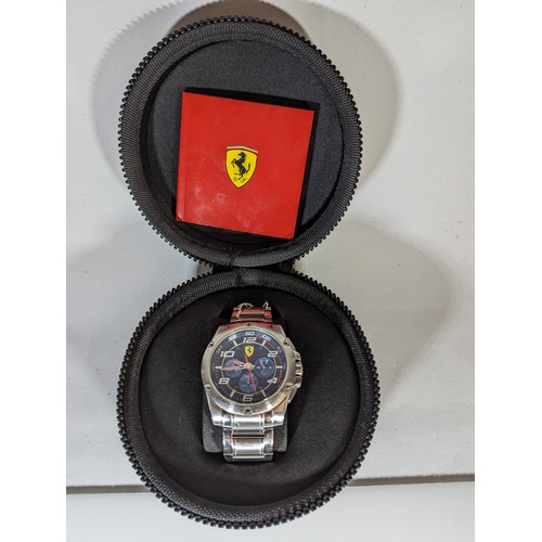 553 - Ferrari gents chronograph stainless steel wristwatch, numbered SF.04.1.14.0020 with zipped case and ... 