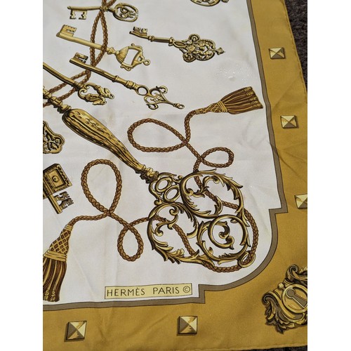 546 - Hermes Paris, silk scarf with key design in ochre colourway 'Les Clefs' by Caty Latham, 89 x 89cm. S... 