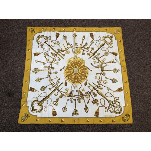 546 - Hermes Paris, silk scarf with key design in ochre colourway 'Les Clefs' by Caty Latham, 89 x 89cm. S... 