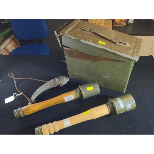 545 - Two replica German stick grenades, ammunition tin and a replica powder keg