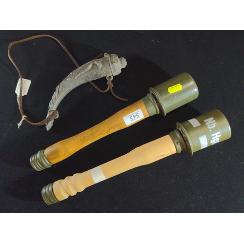 545 - Two replica German stick grenades, ammunition tin and a replica powder keg