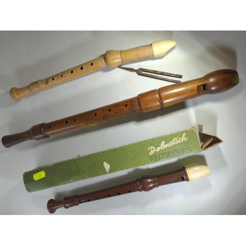 551 - Wooden alto, two various recorders and a 'C' tuning fork