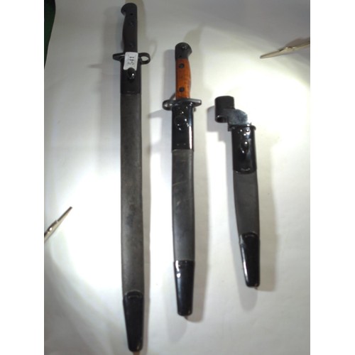 541 - Three reproduction British WWII bayonets