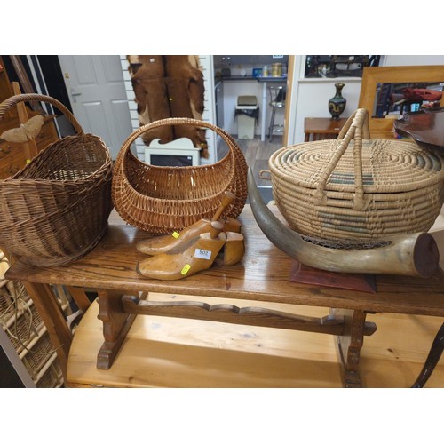 902 - Selection of wicker baskets, pair of shoe trees and a horn vase. 