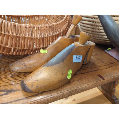 902 - Selection of wicker baskets, pair of shoe trees and a horn vase. 