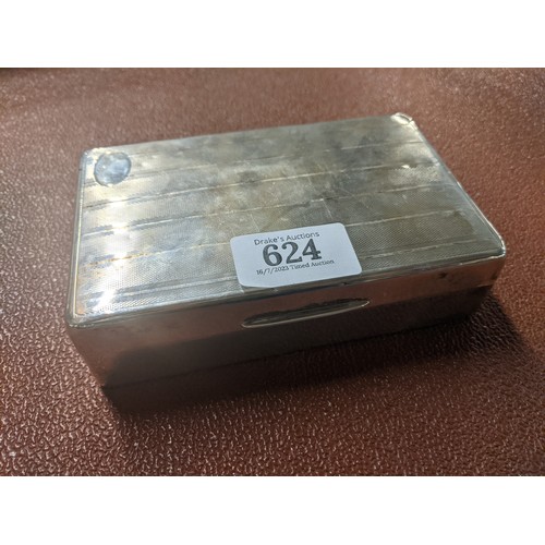 624 - 
Silver engine-turned cigarette box, hallmarks rubbed, 14cm wide, wood lined, gross weight 364 grams... 