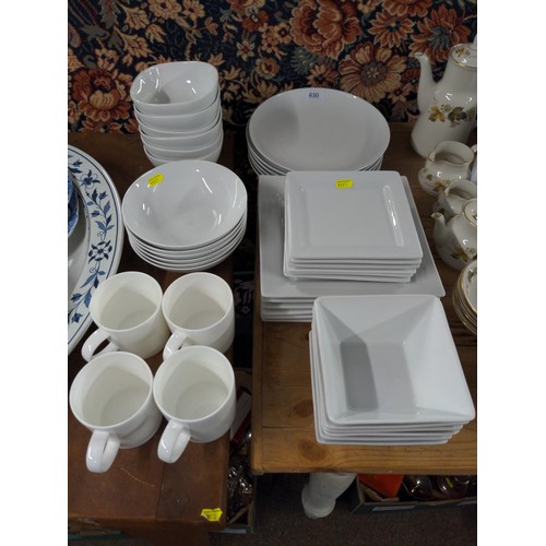 White porcelain dinner ware including M S comprising 6