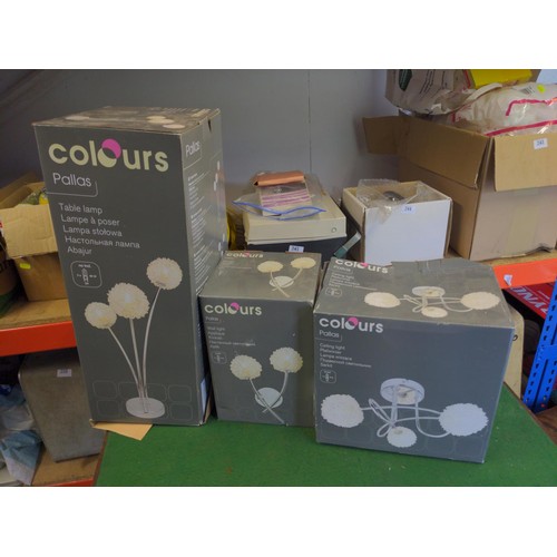 217 - 8 boxed colours (Pallas) light fittings inc. wall lamps, desk lamp & ceiling lamps