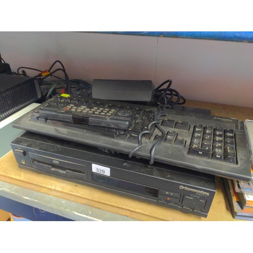 Commodore CDTV unit, together with remote control unit 252594-01 ...