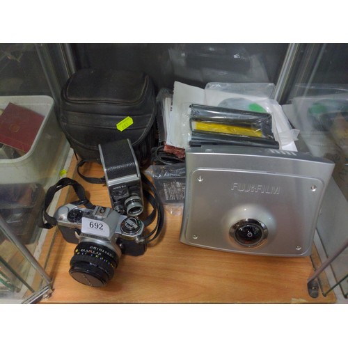 Pentax ME Super camera, Paillard-Bolex cine camera and Fujifilm