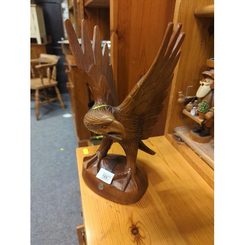 987 - carved eagle with open wings, made in Philippines, ht 32 cms to wingtip, 