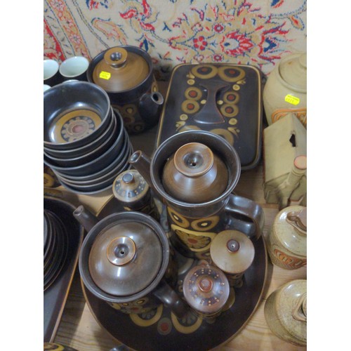 91 - Large quantity of 1970's Denby tea, dinner and serving ware