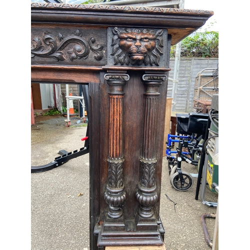 531 - Large decorative oak fire surround . W172 D27 H124 cm approximately.