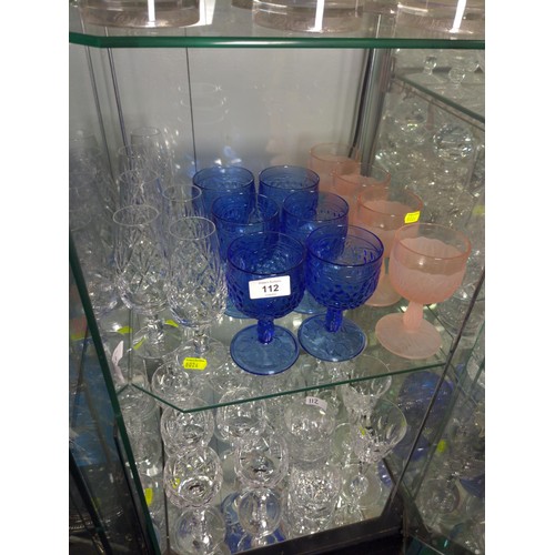 112 - Glassware over 2 shelves inc coloured & dimple glassware