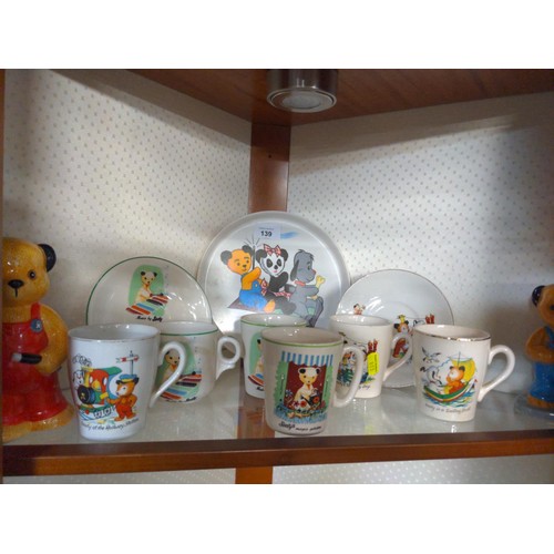 139 - Sooty items over 2 shelves inc eggcups