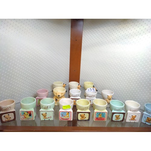 139 - Sooty items over 2 shelves inc eggcups