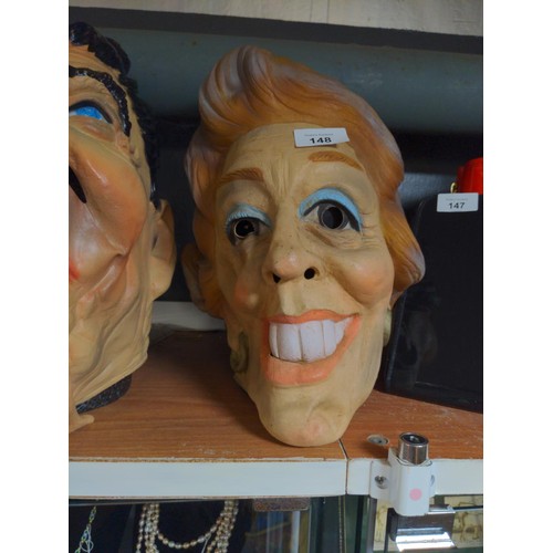 148 - Cesar character masks of Nancy Reagan & Ronald Reagan, marked 'Cesar 83'