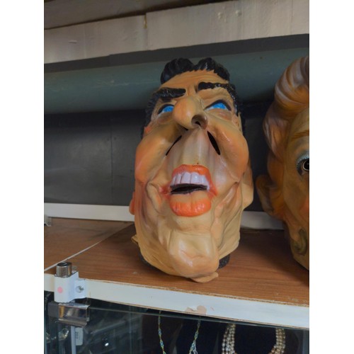 148 - Cesar character masks of Nancy Reagan & Ronald Reagan, marked 'Cesar 83'