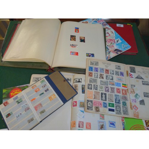 169 - Collection of part-filled stamp albums with mostly used British and world stamps