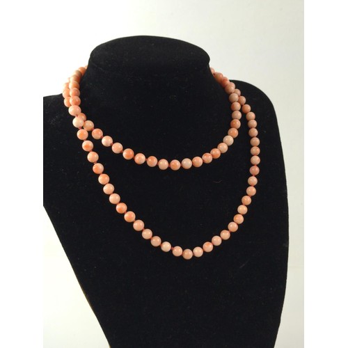 192 - Angel skin coral bead necklace. Circumference 720mm