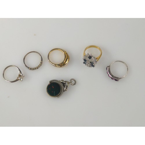 215 - Swing fob and five assorted rings