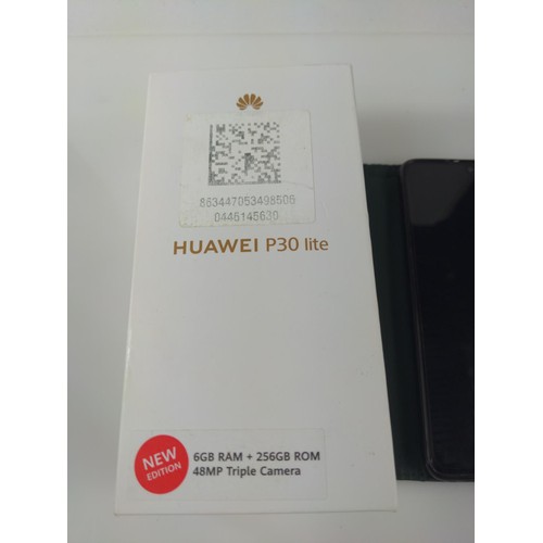 254 - Huawei P30 lite 256GB mobile phone with instructions, usb cable, box and green folding case