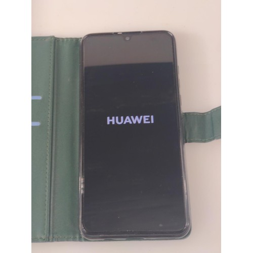 254 - Huawei P30 lite 256GB mobile phone with instructions, usb cable, box and green folding case