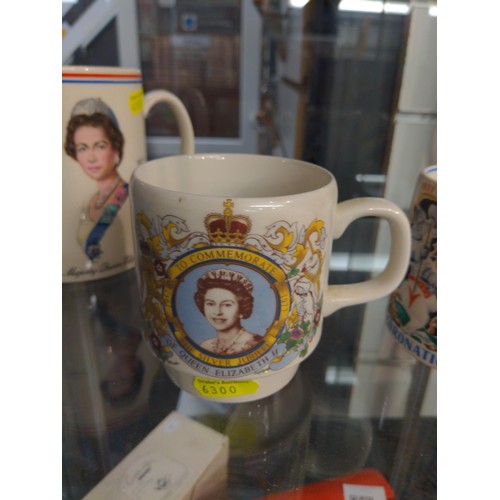 321 - 3 Commemorative mugs, two QE 11 silver jubilee and one with coronation of Edward the 8th. Signed by ... 