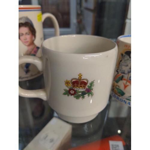 321 - 3 Commemorative mugs, two QE 11 silver jubilee and one with coronation of Edward the 8th. Signed by ... 