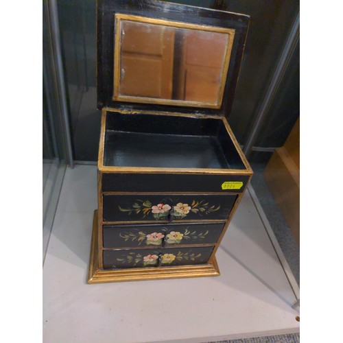 324 - Small 3 drawer black & gilt jewellery box with handle painted floral design W20cm x D14cm x H22c... 