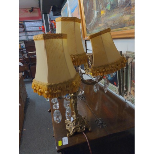 330 - Small brass four position candelabra light with glass bead detail and matching shades. H48 cm