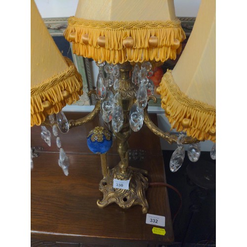 330 - Small brass four position candelabra light with glass bead detail and matching shades. H48 cm