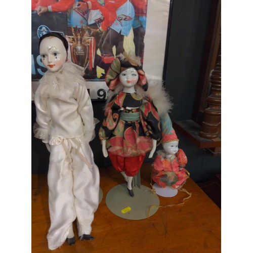 341 - Collection of 6 Poirot Clowns, Jester dolls and others all with porcelain heads.