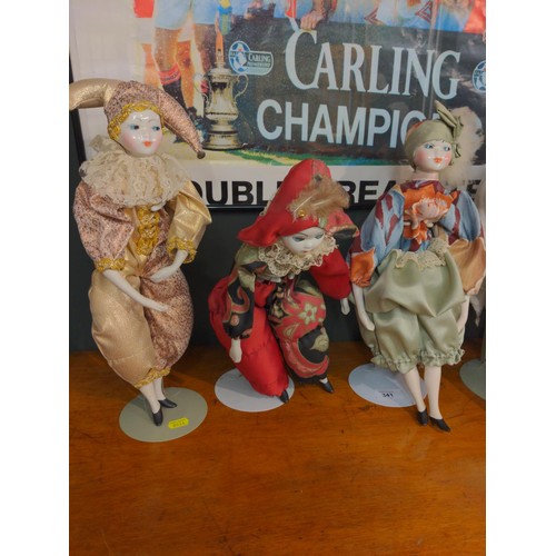 341 - Collection of 6 Poirot Clowns, Jester dolls and others all with porcelain heads.