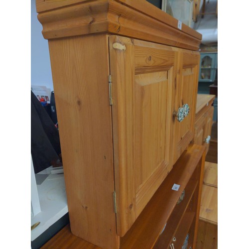 363 - Pine two door, two shelves wall hanging cabinet. W75.5 D17.5 H56 cm