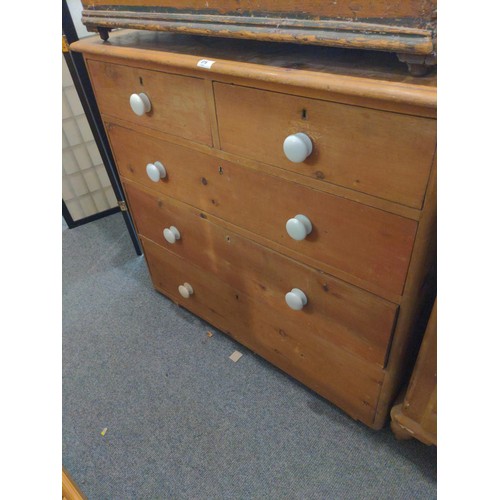 379 - Two over three stripped pine chest of drawers with white knobs. W105 D52 H93 cm