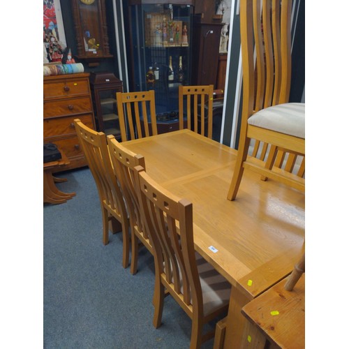 386 - Modern oak extending dining table with 8 chairs. width 160cm x depth 90cm x 76cm height